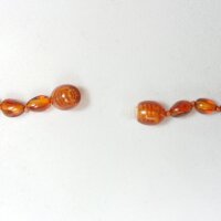 Babybernsteinkette "Böhnchen", ca. 32-34 cm einfärbig Drehschließe