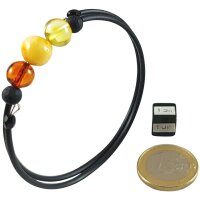 Spiralarmband, Bernstein mit Lava auf Kautschuk